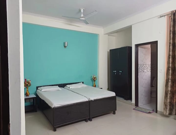 Double sharing room at BABA PG HOUSE